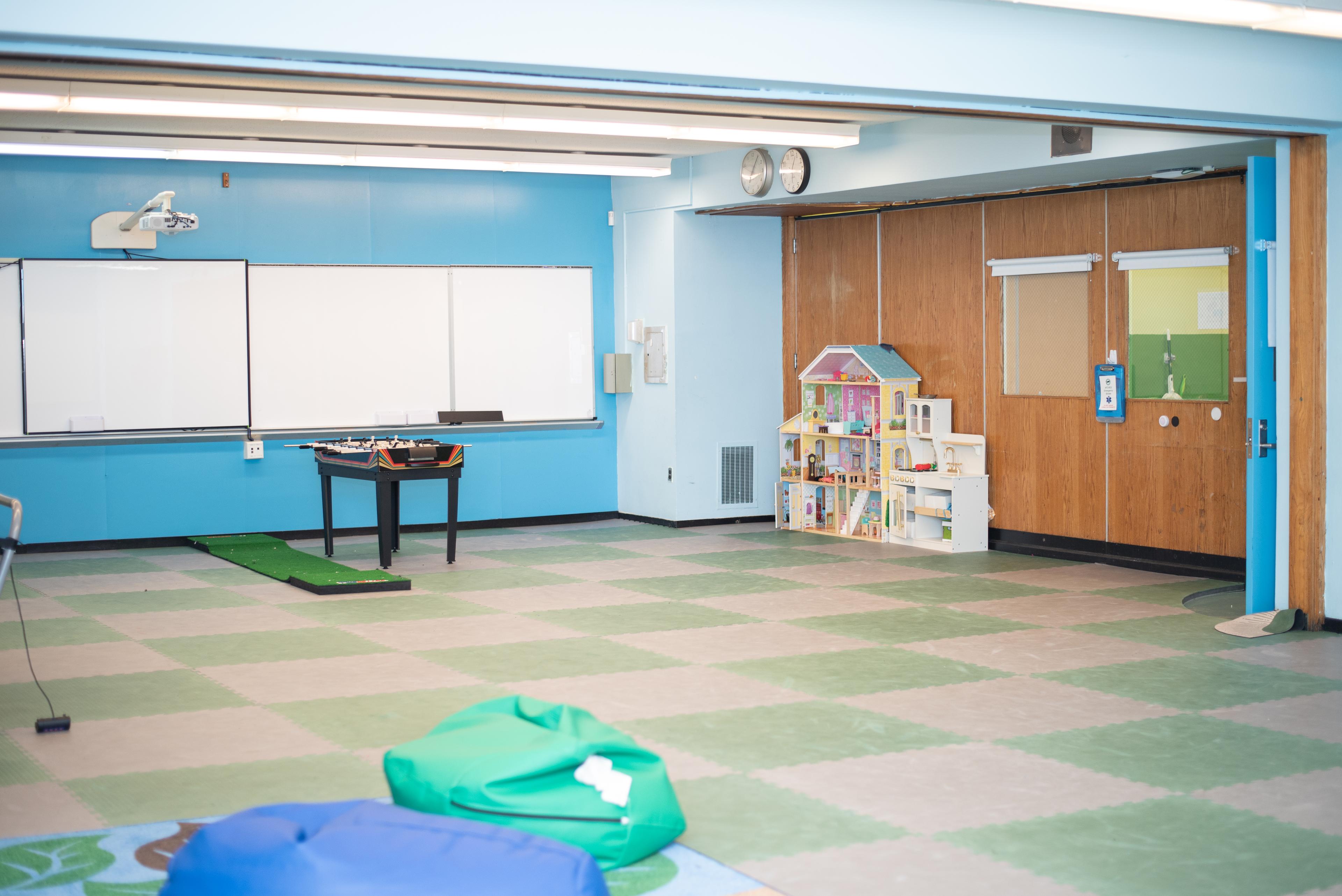 Students exploring the playroom