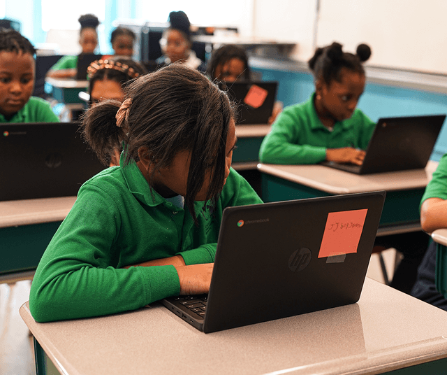 Students working on coding projects