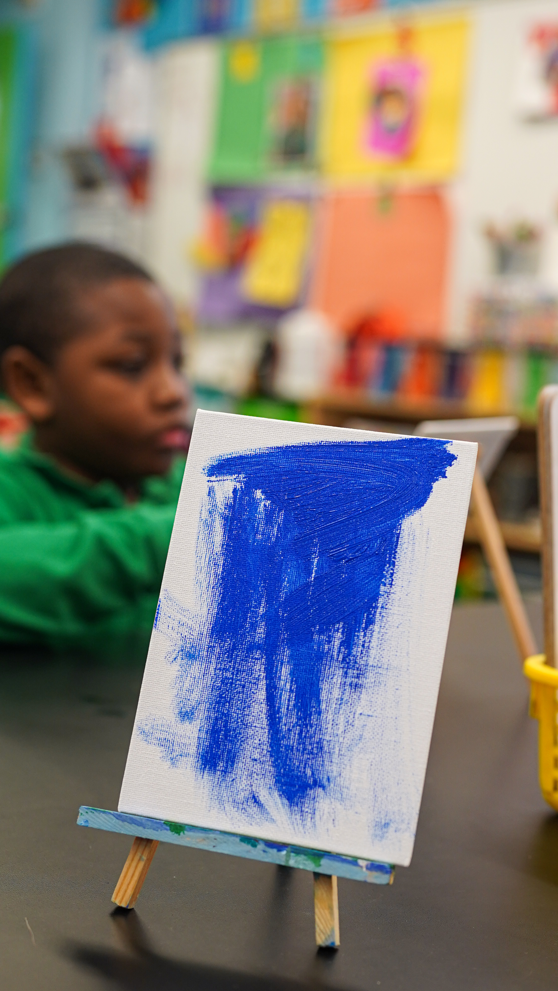 Student creating artwork